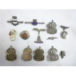 A selection of various silver badges and sweetheart brooches including five ARP lapel badges,