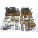 A selection of early communications instruments and accessories comprising two brass and ebonite