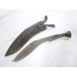 A Gurkha kukri with curved single-edged blade,