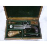 A late 18th /early 19th Century flintlock double barrel tap-action pistol by Clarke of London with