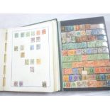 A stock book containing a collection of GB stamps, Victoria onwards including four-margin 1d black,