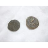 An old Indian Moghul bronze coin and a Roman coin (2)