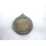 An early Victorian silver medal "Presented to C Adams by a few friends as a mark of esteem,