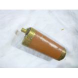A good quality copy brass and leather combination pistol powder flask with bullet holder