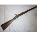 An 1861 Enfield three-band percussion musket with 36" steel barrel, engraved steel lock,