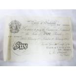 A Bank of England white £5 note dated 1955,