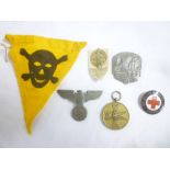 A selection of original Second War German insignia including enamelled Red Cross Badge,