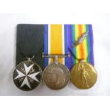 An Order of Johns silver and enamelled Serving Brother Medal together with First War pair of medals