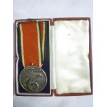 A German Nazi NSDAP Blood Order silver medal with ribbon,
