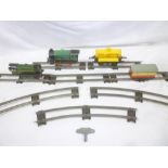 Hornby 0 gauge - two clockwork tin plate locomotives, shell tank wagon,