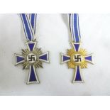 Two Second War German Nazi enamelled mother's crosses - silver and gold grades