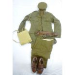 A Second War Officers Khaki uniform of The Royal Artillery including Colonel's tunic with bronze
