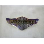 An unusual enamelled and chromium plated Panther sports car bonnet badge