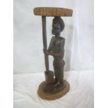 A good quality old African carved wood one-piece rustic table,