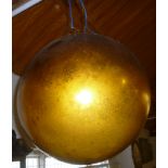 A large old gilt glass witch ball 15" diameter