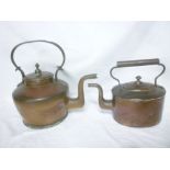 An early 19th century Cornish copper kettle by Tregellis & Son and one other copper oval kettle (2)