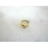 A 14ct gold twin section dress ring set sapphires