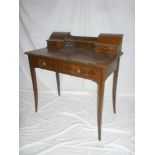 A late Victorian mahogany ladies writing table with inset writing surface,