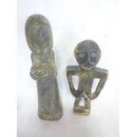 A tribal style carved stone figure of a female with child and one other carved stone figure (2)