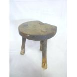 A 19th Century rustic elm circular three-legged milking stool (af)