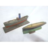 An old wooden model of a tug boat and one other wooden boat model (2) (af)