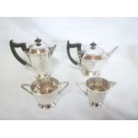 A good quality EPNS Art Deco-style tea and coffee set comprising tapered coffee pot with ebonised