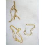 A 9ct white and yellow gold rope twist bracelet and two various 9ct gold fine link chain necklaces
