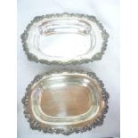 A pair of electro-plated oval graduated serving bowls with decorated scallop borders