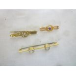 A 9ct gold bar brooch set amethyst,