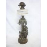 An unusual 19th Century oil lamp,