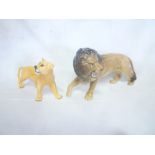 Two Beswick china figures of a male lion and lioness