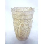 An Arundel Society plaster copy of an early urn with raised figure decoration