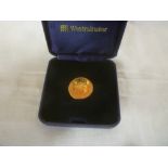 An Elizabeth II 2002 gold sovereign,