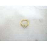 An 18ct gold engagement ring set various diamonds