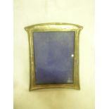 A George V silver rectangular photo frame with decorated edge,