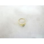 A 14ct gold dress ring set moss agate