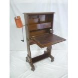 A late Victorian burr walnut and mahogany upright writing desk with pigeon holes,