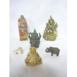 An Eastern soapstone table seal with Buddha decoration, bronze elephant god figure,