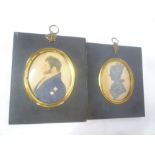 A 19th Century miniature portrait silhouette depicting bust portrait of a female in ebonised frame