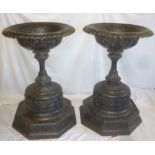 A pair of impressive Victorian cast iron circular classical shaped garden urns with lobed borders,