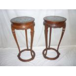 A pair of good quality Chinese carved wood circular centre tables,