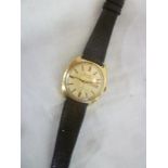 A gentleman's gold plated wristwatch by Bulova "The Ambassador" with leather strap,