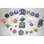 A collection of twenty-five various modern paperweights including numerous Caithness examples -
