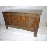 An 18th Century carved oak rectangular coffer,