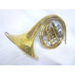 A good quality brass French horn by John Grey & Sons London in modern fitted case