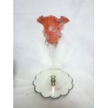 An unusual cranberry tinted glass ornamental pedestal bowl with mirrored circular base