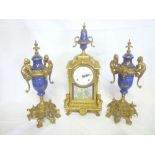 A modern brass mantel clock garniture with circular enamelled dial and porcelain mounts together