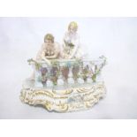 A good quality Continental porcelain figure of two females on a balcony "Al Balcone" ,