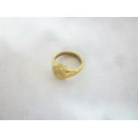 A large heavy 9ct gold signet ring with engraved initials