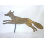 An old painted metal top from a weather vane depicting a running fox